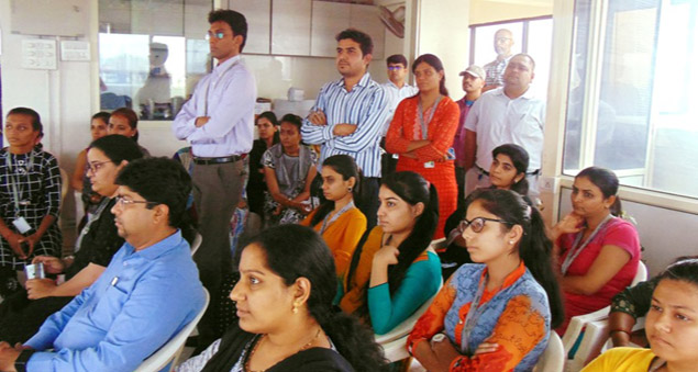 team celebrating 21 years of excellence and growth with joy and unity