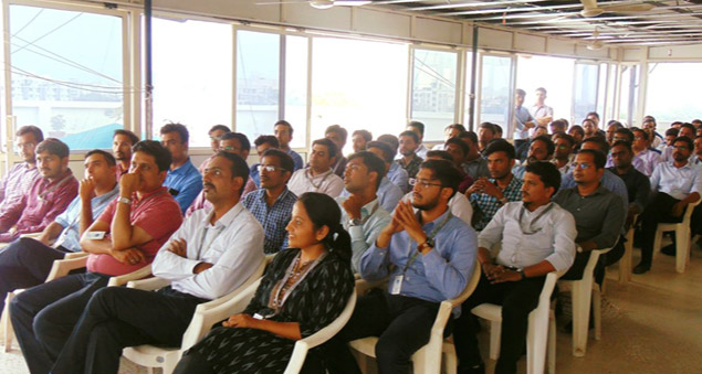 team celebrating 21 years of excellence and growth with joy and unity