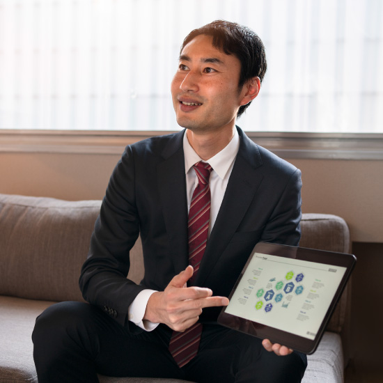 Team analyzing old code on a digital whiteboard for refactoring