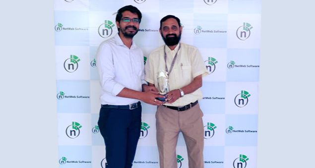 employees enjoying an indoor carrom tournament with team spirit