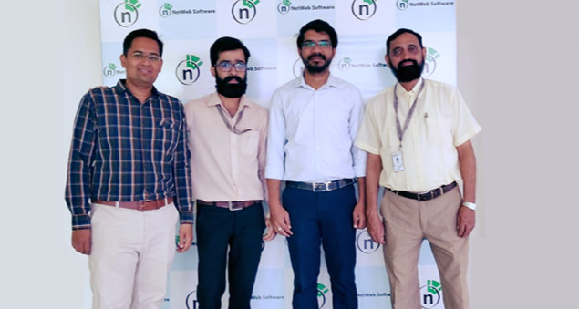 employees enjoying an indoor carrom tournament with team spirit