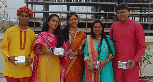 employees enjoying festive diwali celebration with decor and lights