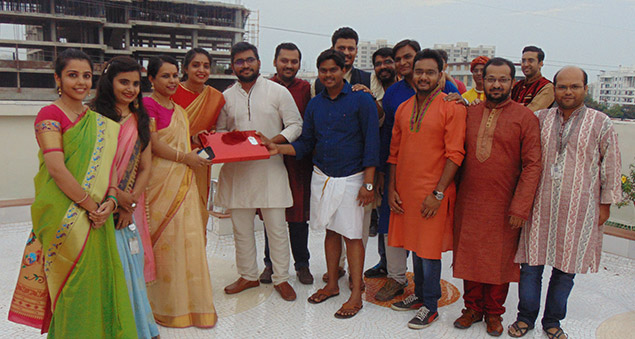 employees enjoying festive diwali celebration with decor and lights
