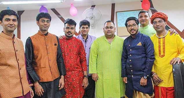 employees enjoying festive diwali celebration with decor and lights