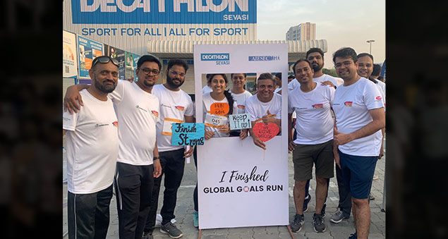 employees participating in the 2022 global goals run in collaboration with aiesec