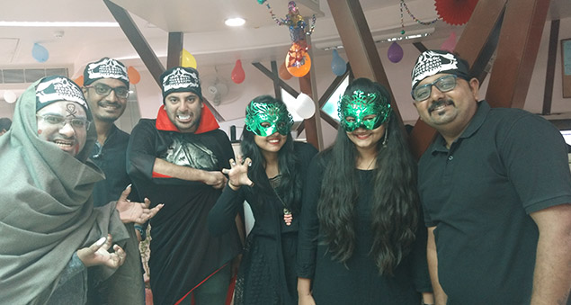 team members in creative costumes during halloween celebrations 2019