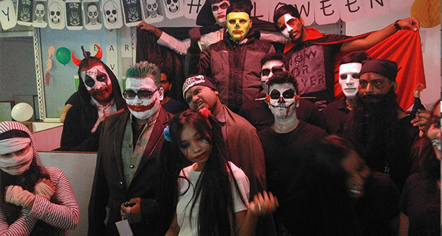 team members in creative costumes during halloween celebrations 2019