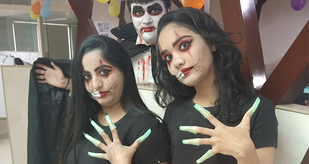 team members in creative costumes during halloween celebrations 2019