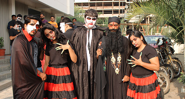team members in creative costumes during halloween celebrations 2019