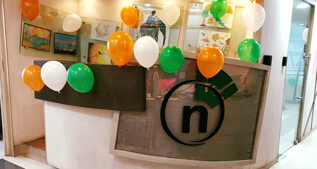 team members celebrating india’s independence day with flag hoisting