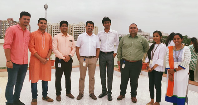 team members celebrating india’s independence day with flag hoisting