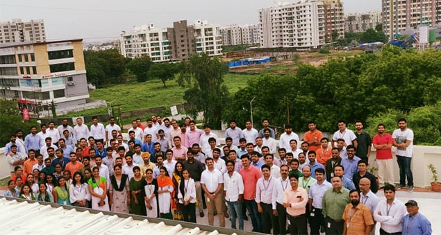 team members celebrating india’s independence day with flag hoisting
