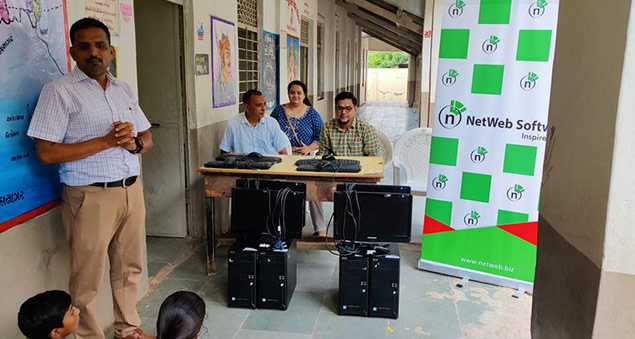 employees conducting outreach to support digital education for underserved communities