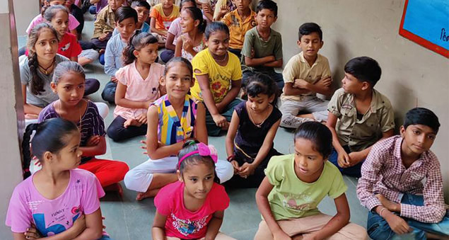 employees conducting outreach to support digital education for underserved communities