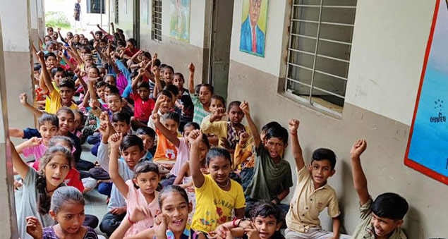 employees conducting outreach to support digital education for underserved communities