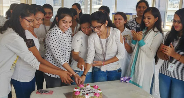 team celebrating women’s day with events honoring women leaders and team members