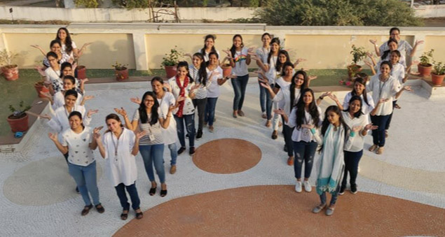 team celebrating women’s day with events honoring women leaders and team members