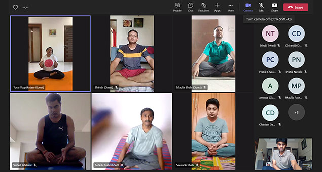 team performing yoga sessions during international yoga day 2022