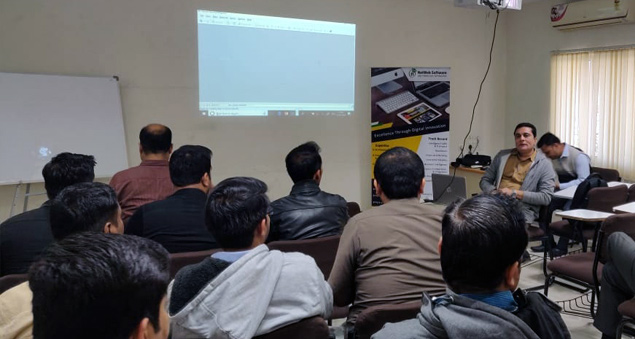 attendees learning applied machine learning techniques at internal workshop