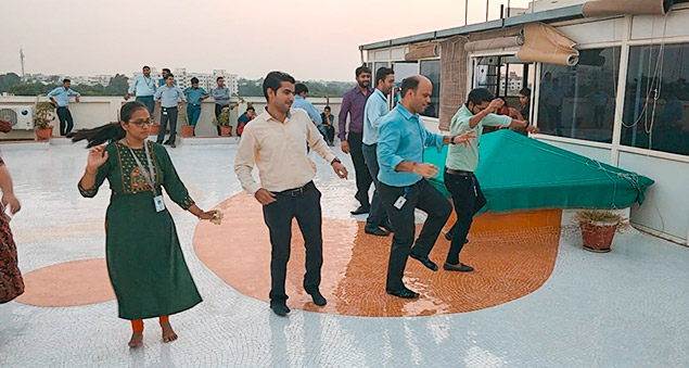 employees celebrating navratri and dussehra with dance and tradition