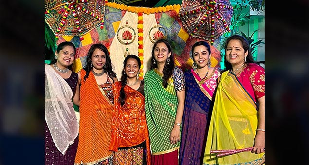 employees dancing during navratri garba night in traditional attire in 2022