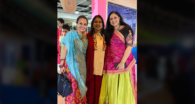 employees dancing during navratri garba night in traditional attire in 2022
