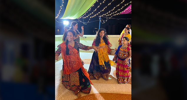 employees dancing during navratri garba night in traditional attire in 2022