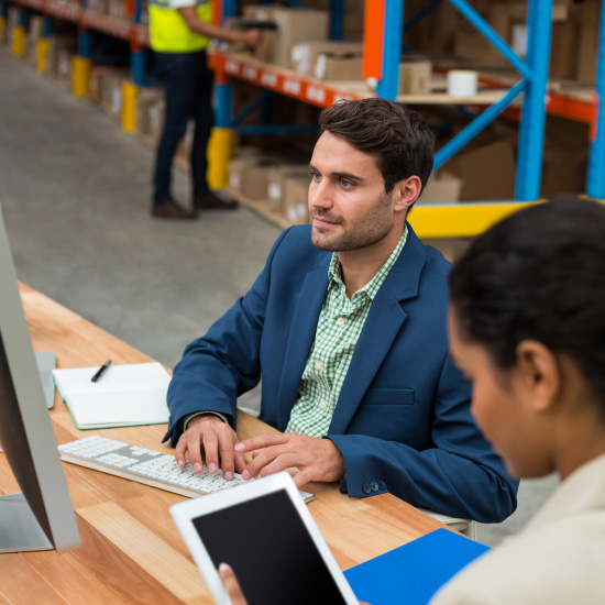 Close-up of developer updating source code on a laptop