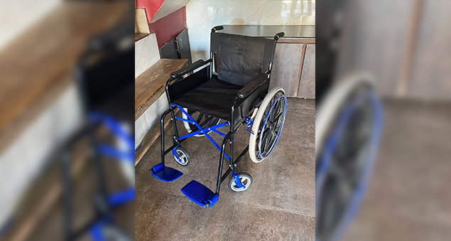 employees interacting and supporting specially-abled individuals during a community initiative