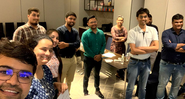 employees engaged in mentor mentee development sessions