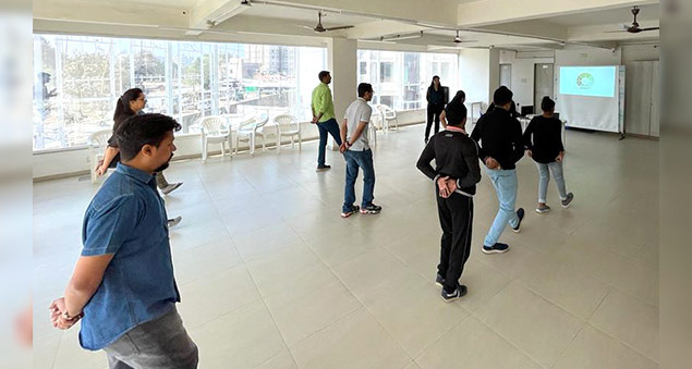 employees participating in wellness week activities promoting health and mental wellbeing