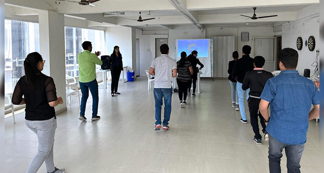 employees participating in wellness week activities promoting health and mental wellbeing